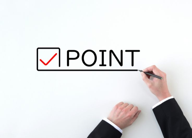 ポイントとチェックマークの書かれた紙